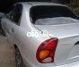 Daewoo Lanos MT 2003 - Cần bán gấp Daewoo Lanos MT sản xuất 2003, màu bạc, nhập khẩu