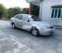 Chevrolet Lacetti MT 2011 - Cần bán xe Chevrolet Lacetti MT năm 2011, màu bạc