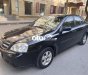 Daewoo Lacetti   EX 2010 - Cần bán Daewoo Lacetti EX sản xuất năm 2010, màu đen số sàn, giá 150tr