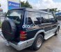Mitsubishi Pajero 2.4 2000 - Cần bán lại xe Mitsubishi Pajero 2.4 đời 2000, màu xanh lam còn mới, giá 90tr