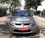 Mitsubishi Grandis AT 2009 - Cần bán xe Mitsubishi Grandis AT 2009, màu xám 