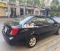 Daewoo Lacetti   EX 2010 - Cần bán Daewoo Lacetti EX sản xuất năm 2010, màu đen số sàn, giá 150tr