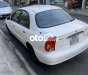 Daewoo Lanos MT 2003 - Cần bán Daewoo Lanos MT đời 2003, màu trắng, nhập khẩu nguyên chiếc chính chủ