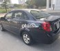 Daewoo Lacetti   EX 2010 - Cần bán Daewoo Lacetti EX sản xuất năm 2010, màu đen số sàn, giá 150tr