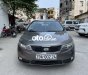 Kia Forte  MT 2010 - Cần bán gấp Kia Forte MT đời 2010, màu xám, nhập khẩu nguyên chiếc chính chủ