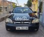 Daewoo Lacetti MT 2005 - Cần bán xe Daewoo Lacetti MT sản xuất 2005, màu đen