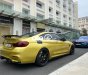 BMW M4 2017 - Bán ô tô BMW M4 sản xuất năm 2017, màu vàng, nhập khẩu