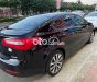 Kia K3  MT 2013 - Xe Kia K3 MT năm 2013, màu đen