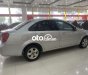 Chevrolet Lacetti 1.6MT  2013 - Cần bán Chevrolet Lacetti 1.6MT năm sản xuất 2013, màu bạc