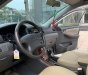 Toyota Corolla 1.8 AT 2005 - Cần bán xe Toyota Corolla 1.8 AT sản xuất năm 2005, màu bạc, nhập khẩu