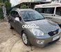 Kia Carens MT 2011 - Bán Kia Carens MT sản xuất 2011, màu xám xe gia đình