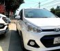 Hyundai Premio MT 2014 - Cần bán gấp Hyundai Grand i10 MT năm sản xuất 2014, màu trắng