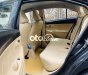 Toyota Vios E 2015 - Bán Toyota Vios E năm sản xuất 2015, màu đen số sàn, giá chỉ 295 triệu