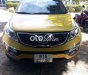 Kia Sportage 2011 - Cần bán gấp Kia Sportage 1.6GDi sản xuất năm 2011, màu vàng, nhập khẩu