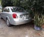 Daewoo Lacetti MT 2004 - Bán xe Daewoo Lacetti MT năm sản xuất 2004, màu bạc