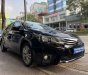 Toyota Corolla altis 2017 - Bán gấp Toyota Corolla Altis 1.8G AT năm 2017, màu đen, còn nguyên dàn lốp, xe rất mới, giá tốt