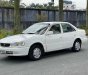 Toyota Corolla MT 2001 - Bán ô tô Toyota Corolla MT sản xuất 2001, màu trắng, giá chỉ 99 triệu
