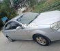 Daewoo Lacetti MT 2005 - Cần bán gấp Daewoo Lacetti MT năm sản xuất 2005, màu bạc, giá chỉ 85 triệu