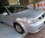 Daewoo Lacetti  EX 2005 - Cần bán gấp Daewoo Lacetti EX năm sản xuất 2005, màu bạc, giá 120tr