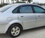 Daewoo Lacetti MT 2005 - Cần bán gấp Daewoo Lacetti MT năm 2005, màu bạc xe gia đình