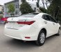 Toyota Corolla 2019 - Cần bán lại xe Toyota Corolla Altis sản xuất 2019, màu trắng, giá tốt