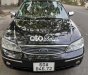 Ford Laser  GHIAAT 2004 - Bán ô tô Ford Laser GHIAAT sản xuất năm 2004, màu đen xe gia đình, giá 165tr