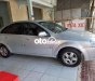 Daewoo Lacetti  EX 2005 - Cần bán gấp Daewoo Lacetti EX năm sản xuất 2005, màu bạc, giá 120tr