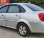 Daewoo Lacetti MT 2005 - Cần bán gấp Daewoo Lacetti MT năm 2005, màu bạc xe gia đình