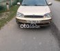 Ford Laser    MT 2002 - Bán Ford Laser MT năm 2002, màu vàng