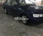 Toyota Corolla 1.6 GLi 2001 - Bán Toyota Corolla 1.6 GLi năm 2001, màu đen, giá 132tr