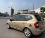 Kia Carens LX 2010 - Cần bán Kia Carens LX sản xuất năm 2010, màu nâu còn mới, giá chỉ 215 triệu