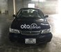 Toyota Corolla 1.6 GLi 2001 - Bán Toyota Corolla 1.6 GLi năm 2001, màu đen, giá 132tr