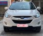 Hyundai Tucson 2013 - Cần bán gấp Hyundai Tucson ATH sản xuất 2013, màu trắng, nhập khẩu nguyên chiếc