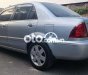 Ford Laser   Ghia 1.8 MT 2002 - Cần bán xe Ford Laser Ghia 1.8 MT sản xuất năm 2002, màu bạc 