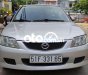 Mazda 323  MT 2002 - Cần bán xe Mazda 323 MT sản xuất 2002, màu bạc, nhập khẩu nguyên chiếc chính chủ