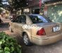 Ford Laser MT 2002 - Cần bán xe Ford Laser MT năm 2002, màu nâu