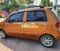 Daewoo Matiz MT 2003 - Cần bán lại xe Daewoo Matiz MT sản xuất 2003, màu nâu, giá tốt