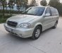 Kia Carnival GS 2009 - Cần bán lại xe Kia Carnival GS sản xuất năm 2009, màu bạc