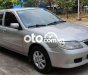 Mazda 323  MT 2002 - Cần bán xe Mazda 323 MT sản xuất 2002, màu bạc, nhập khẩu nguyên chiếc chính chủ