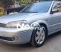 Ford Laser   Ghia 1.8 MT 2002 - Cần bán xe Ford Laser Ghia 1.8 MT sản xuất năm 2002, màu bạc 