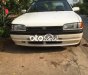 Mazda 323  MT 1996 - Bán Mazda 323 MT năm sản xuất 1996, màu trắng số sàn, giá tốt