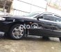 Mazda 626 MT 2001 - Cần bán lại xe Mazda 626 MT sản xuất năm 2001, màu đen