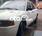 Mazda 323 1996 - Cần bán lại xe Mazda 323 2.0MT sản xuất 1996, màu trắng, xe nhập
