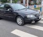 Ford Mondeo V6 2004 - Cần bán lại xe Ford Mondeo V6 sản xuất 2004, màu đen số tự động