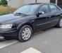 Ford Mondeo V6 2004 - Cần bán lại xe Ford Mondeo V6 sản xuất 2004, màu đen số tự động