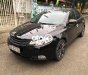Kia Forte 2011 - Cần bán xe Kia Forte SX 2.4 AT năm 2011, màu đen 