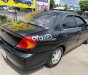 Kia Spectra 2002 - Cần bán xe Kia Spectra năm sản xuất 2002, màu đen chính chủ, 79tr