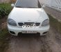 Daewoo Lanos MT 2002 - Bán Daewoo Lanos MT sản xuất năm 2002, màu trắng, xe nhập, giá chỉ 69 triệu