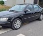 Ford Mondeo V6 2004 - Cần bán lại xe Ford Mondeo V6 sản xuất 2004, màu đen số tự động