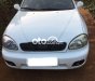 Daewoo Lanos MT 2001 - Cần bán gấp Daewoo Lanos MT sản xuất năm 2001, màu trắng, giá tốt